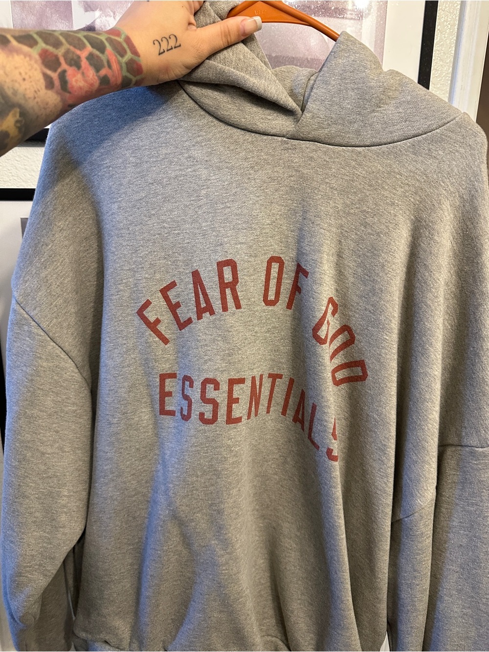 Essentials Gray Hoodie with Red Arch Logo